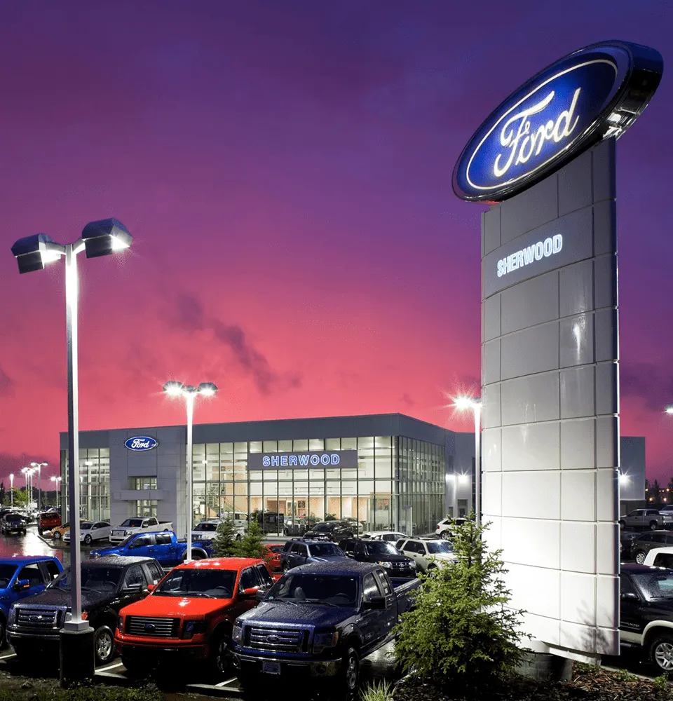Sherwood Ford dealership at dusk