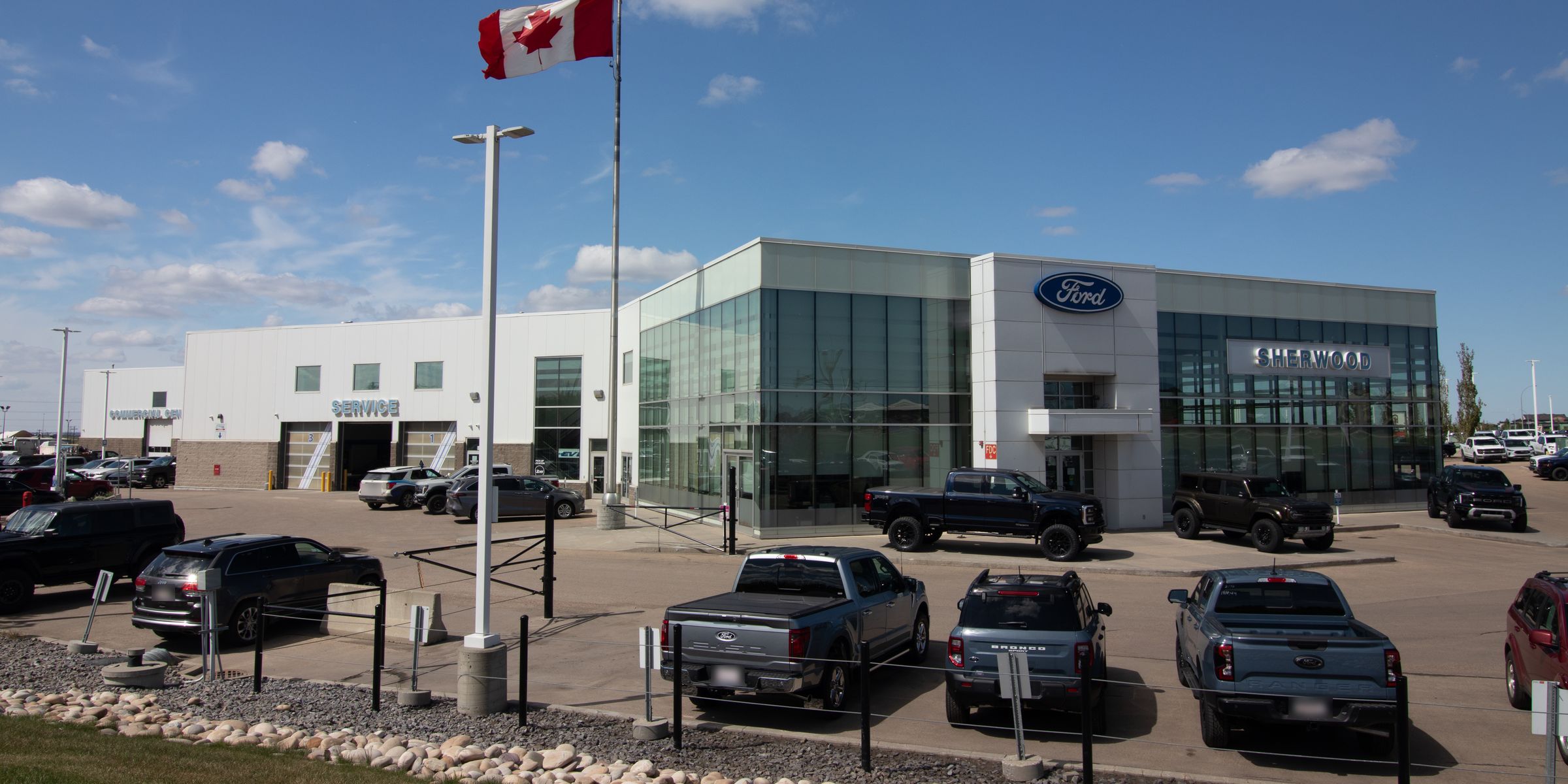 The Sherwood Ford showroom on Broadmoor Blvd